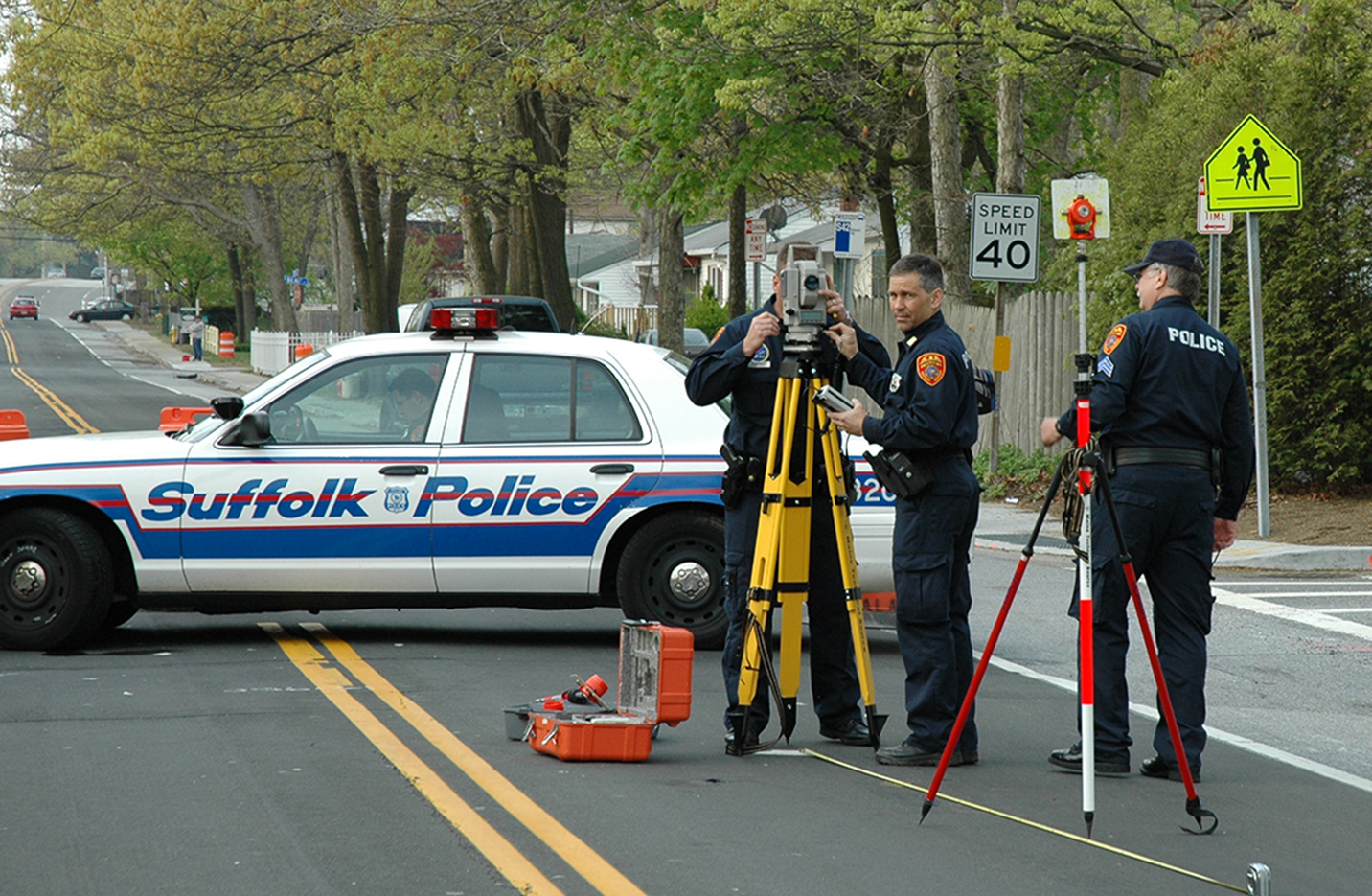 SCPD officers taking pictures of a crime scene
